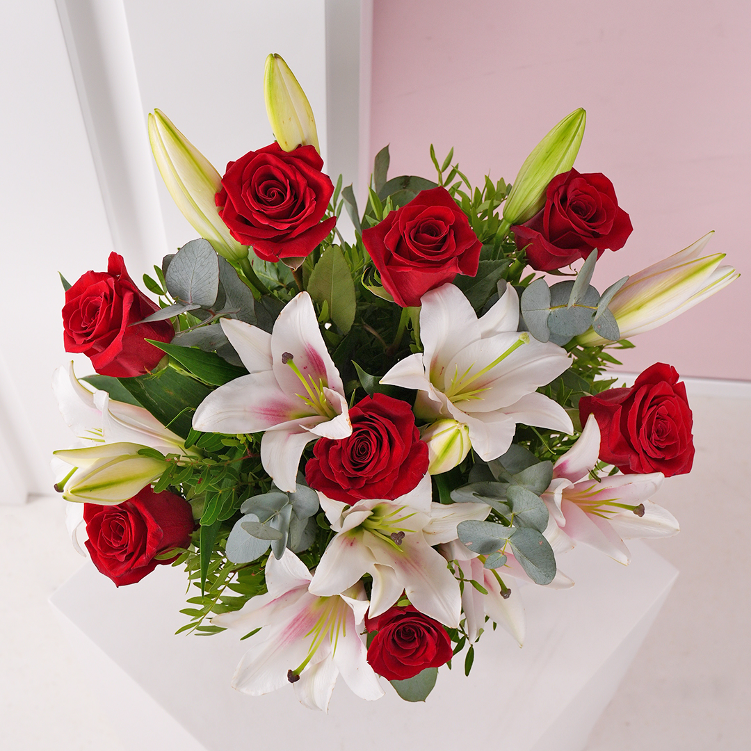 
              Sympathy Red Roses and Pink Lilies